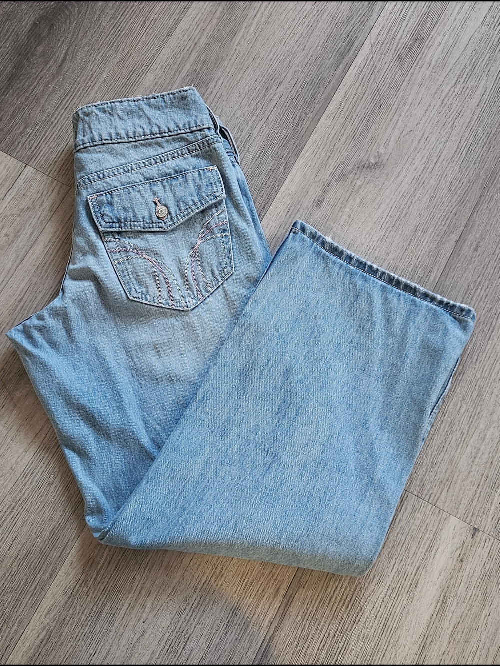 Hollister Light Blue Low-Rise Baggy Jeans with Pink Embroidery Design